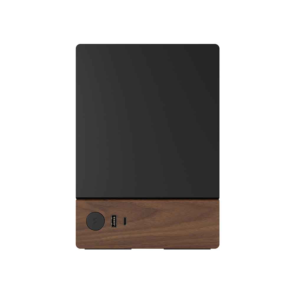Black and wooden electronic device on a white background