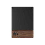 Black and wooden electronic device on a white background