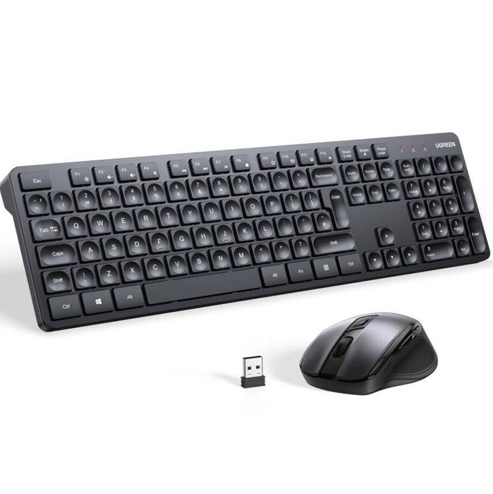Black keyboard and mouse set with USB receiver on a white background